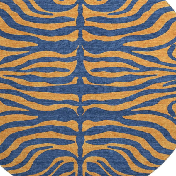 HomeRoots 8' Navy Blue and Orange Animal Print Round Rug - Washable, UV Protected, Durable for Homes & Patios 681830