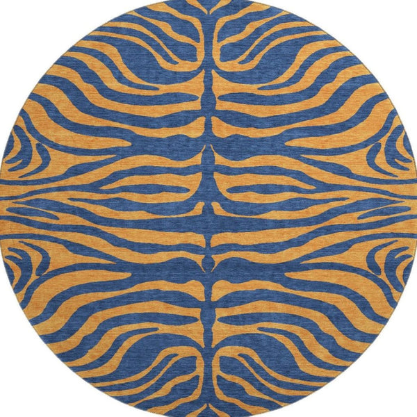 HomeRoots 8' Navy Blue and Orange Animal Print Round Rug - Washable, UV Protected, Durable for Homes & Patios 681830