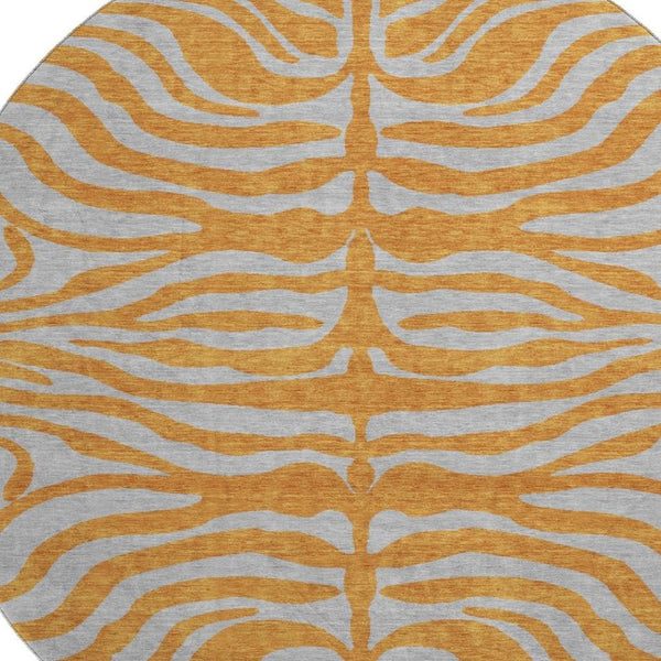 HomeRoots 8' Vibrant Orange and Gray Animal Print Round Rug - Washable, Stain-Resistant, UV Protected Design! 681836