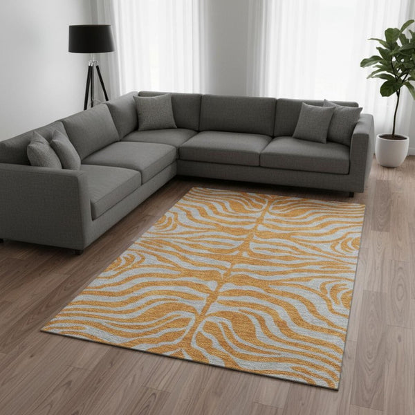 HomeRoots 9' X 12' Animal Print Area Rug in Vibrant Orange & Gray – Washable, Stain-Resistant, and UV Protected 681838