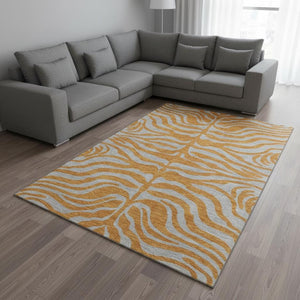 HomeRoots 10' X 14' Vibrant Orange & Gray Animal Print Area Rug - Washable, UV-Protected, and Stain-Resistant! 681839
