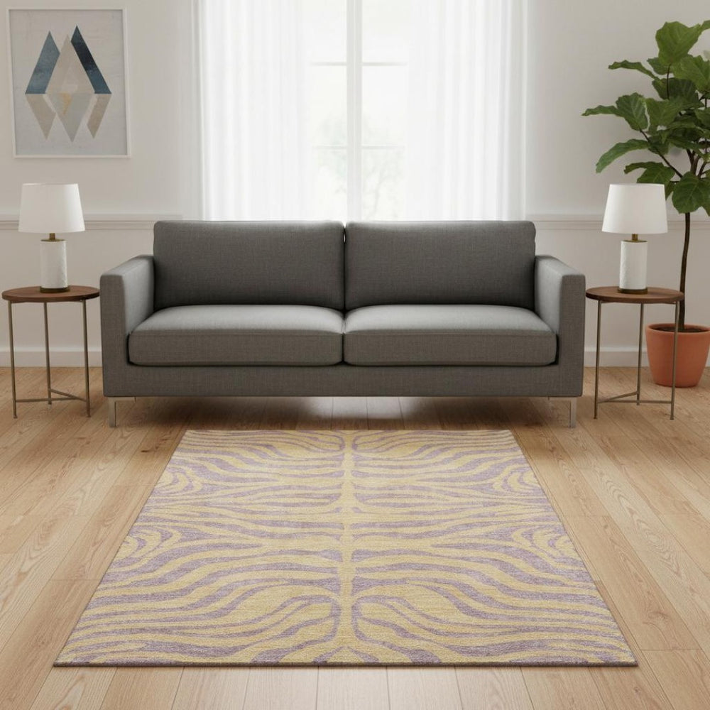 HomeRoots 5' X 8' Stylish Peach & Lavender Animal Print Area Rug - Washable, UV Protected, Stain Resistant! 681841