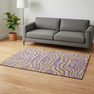 HomeRoots 5' X 8' Animal Print Area Rug in Purple & Peach - Washable, UV-Protected, Durable & Stylish Decor 681853