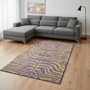HomeRoots 9' X 12' Stylish Purple & Peach Animal Print Washable Area Rug with UV Protection for Home Elegance 681856