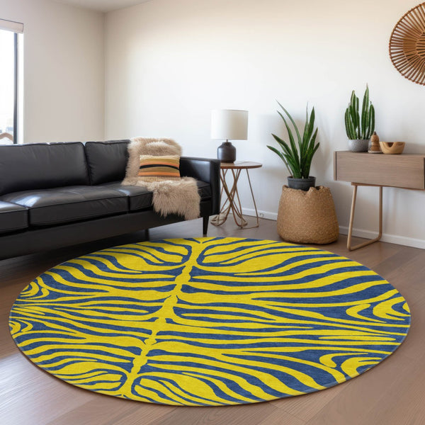 HomeRoots 8' Washable Yellow and Navy Blue Animal Print Round Rug with UV Protection for Modern Spaces 681866