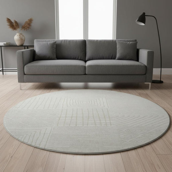HomeRoots 8' Ivory and Beige Geometric Round Rug - Washable, UV Protected, Stain Resistant for Busy Homes 681896