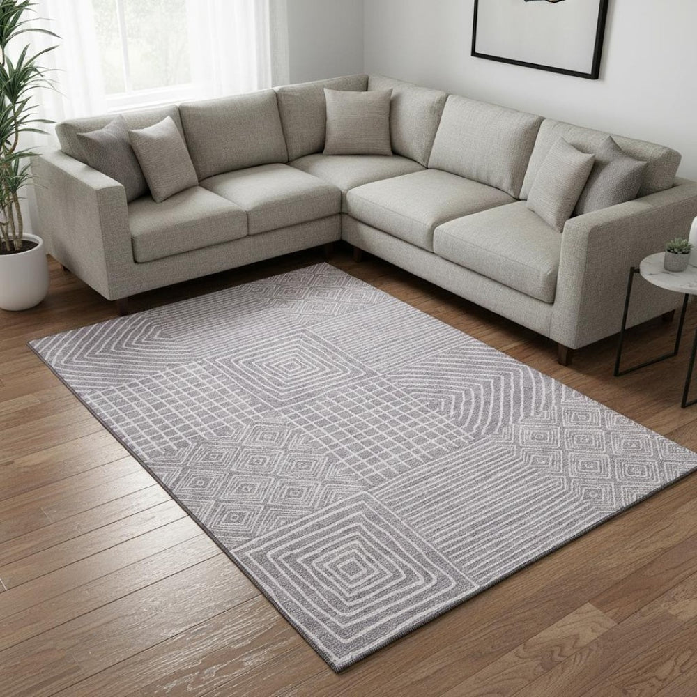 HomeRoots 9' X 12' Stylish Lavender & Ivory Geometric Washable Area Rug with UV Protection & Stain Resistance 681904