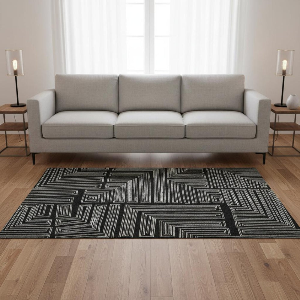 HomeRoots 5' X 8' Stylish Black and Ivory Geometric Washable Area Rug - Durable, UV Protected, Perfect for Families 681949