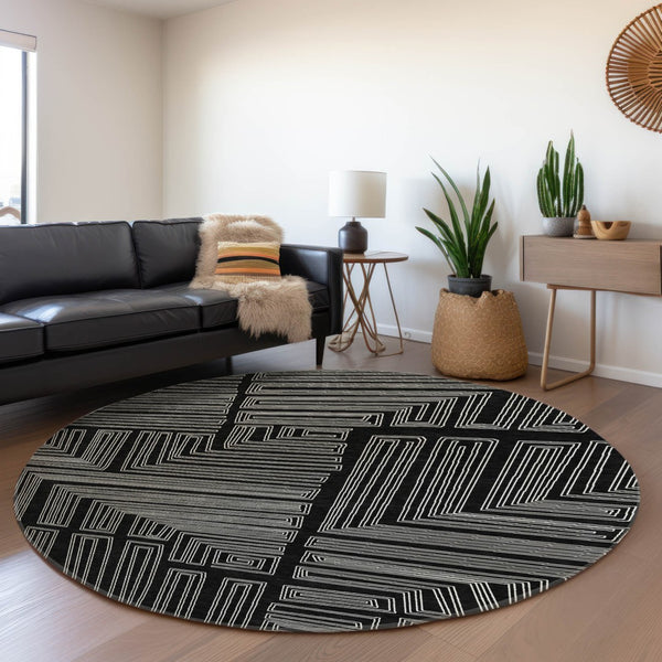 HomeRoots 8' Washable Round Rug in Black and Ivory Geometric Design with UV Protection for Busy Homes 681950