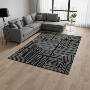 HomeRoots 8' X 10' Black And Ivory Geometric Washable Area Rug - Durable, UV-Protected, Perfect for High-Traffic Spaces 681951