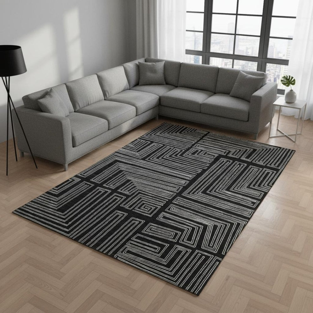 HomeRoots 9' X 12' Modern Black and Ivory Geometric Washable Area Rug with UV Protection for High-Traffic Spaces 681952
