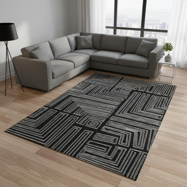 HomeRoots 10' X 14' Black And Ivory Geometric Area Rug – Durable, Washable, UV-Protected for Modern Spaces 681953