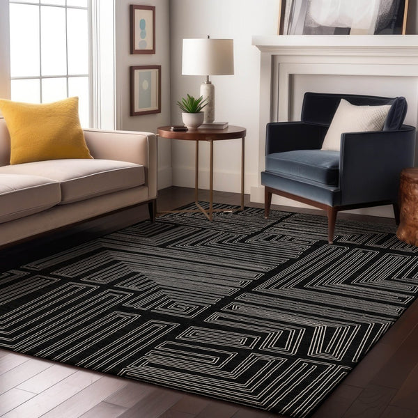 HomeRoots 10' X 14' Black And Ivory Geometric Area Rug – Durable, Washable, UV-Protected for Modern Spaces 681953