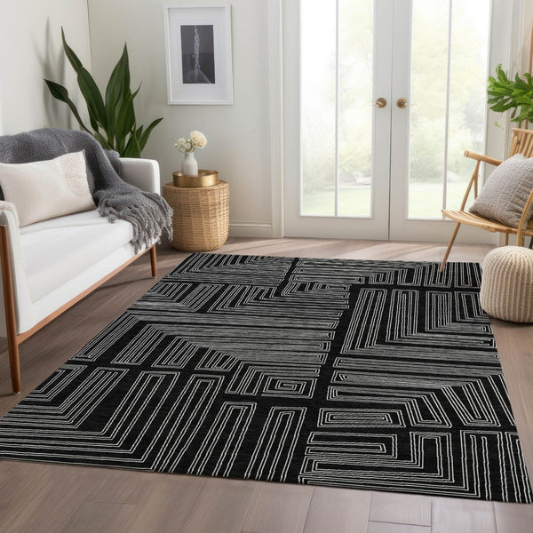 HomeRoots 10' X 14' Black And Ivory Geometric Area Rug – Durable, Washable, UV-Protected for Modern Spaces 681953