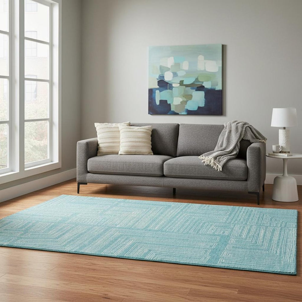 HomeRoots 5' X 8' Turquoise and Ivory Geometric Area Rug - Stylish, Washable, UV-Protected for Busy Homes 682015