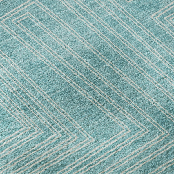 HomeRoots 8' Turquoise & Ivory Geometric Round Rug - Washable, UV Protected, Stylish for High-Traffic Areas 682016