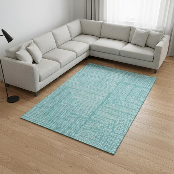 HomeRoots 8' X 10' Vibrant Turquoise and Ivory Geometric Washable Area Rug with Stain Resistance & UV Shield 682017