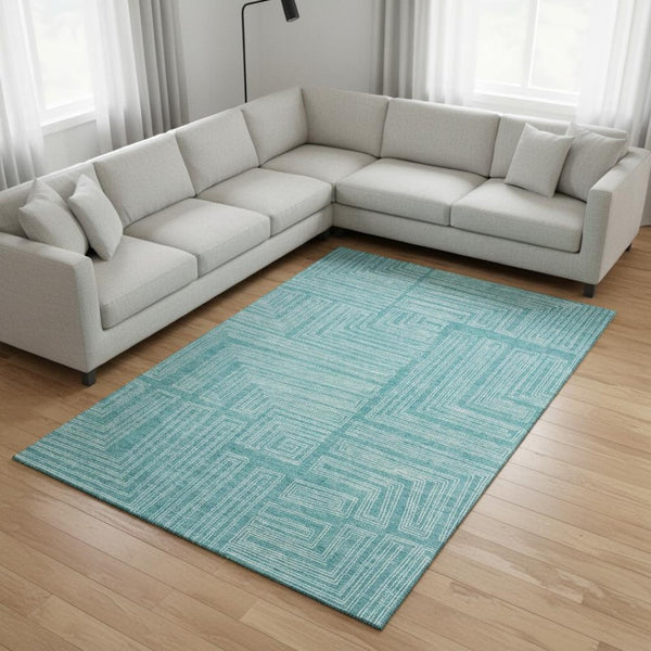 HomeRoots 10' X 14' Turquoise & Ivory Geometric Area Rug - Durable, Washable, UV Protected for Modern Spaces 682019