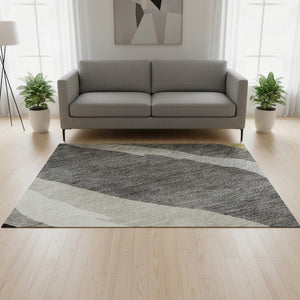 HomeRoots 5' X 8' Modern Black Gold Ivory Abstract Washable Area Rug with UV Protection for Everyday Style 682093