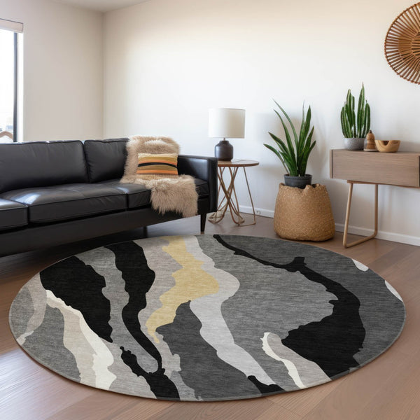 HomeRoots 8' Black Gold and Ivory Abstract Round Rug - Washable, UV-Protected, Stylish for High-Traffic Spaces 682094