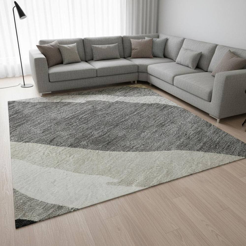HomeRoots 8' X 10' Stylish Black Gold Ivory Abstract Washable Area Rug - Durable, UV-Protected, Family-Friendly! 682095