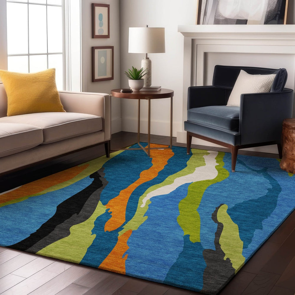 HomeRoots 9' X 12' Vibrant Abstract Area Rug in Denim Blue, Orange & Lime Green - Washable & UV Protected 682114