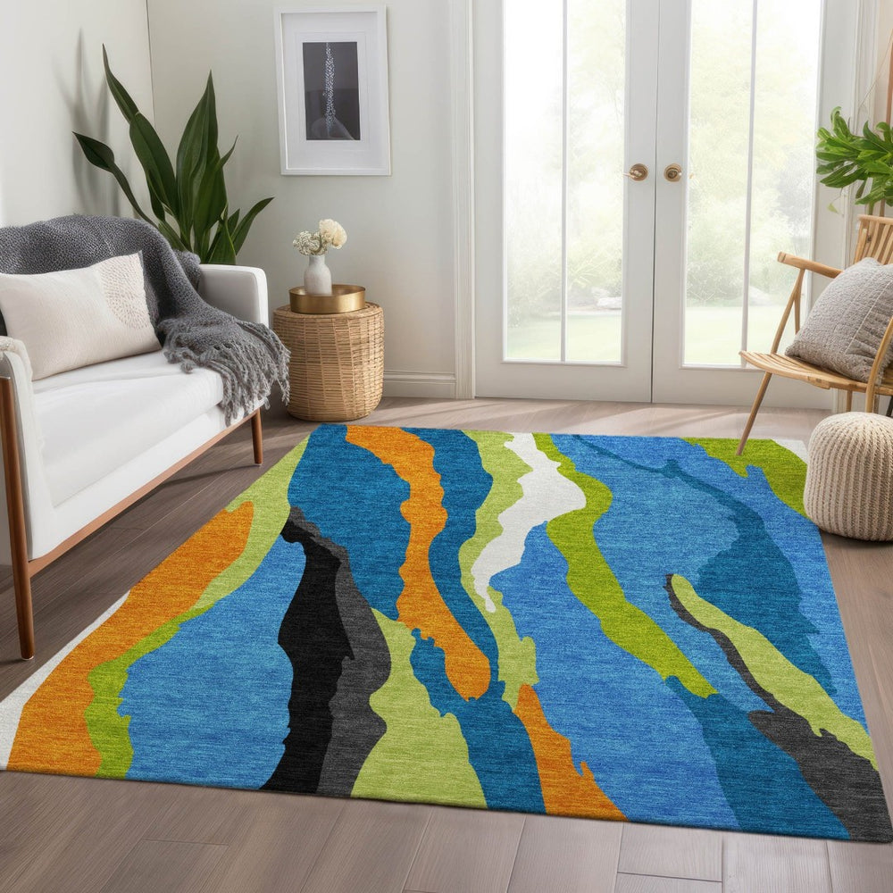 HomeRoots 9' X 12' Vibrant Abstract Area Rug in Denim Blue, Orange & Lime Green - Washable & UV Protected 682114