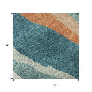 HomeRoots 9' X 12' Teal, Orange & Ivory Abstract Area Rug – Washable, UV Protected, Pet-Friendly Design! 682162