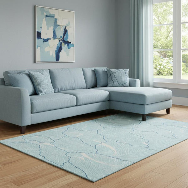 HomeRoots 8' X 10' Aqua Teal and Ivory Abstract Washable Area Rug with UV Protection for Modern Homes 682173