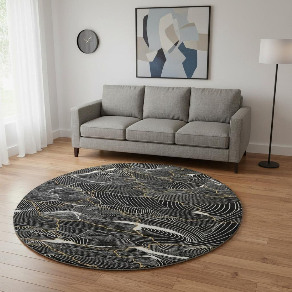 HomeRoots 8' Black Ivory and Gold Abstract Round Rug - Washable, UV Protected, Durable Design for High Traffic Areas 682184