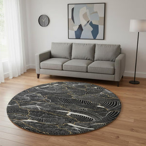 HomeRoots 8' Black Ivory and Gold Abstract Round Rug - Washable, UV Protected, Durable Design for High Traffic Areas 682184