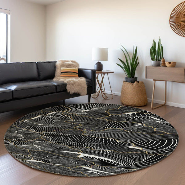 HomeRoots 8' Black Ivory and Gold Abstract Round Rug - Washable, UV Protected, Durable Design for High Traffic Areas 682184