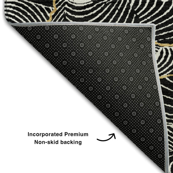 HomeRoots 8' Black Ivory and Gold Abstract Round Rug - Washable, UV Protected, Durable Design for High Traffic Areas 682184