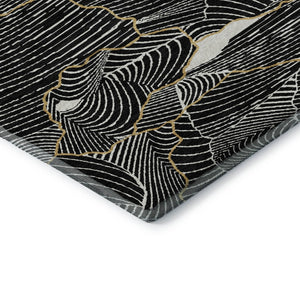 HomeRoots 8' Black Ivory and Gold Abstract Round Rug - Washable, UV Protected, Durable Design for High Traffic Areas 682184