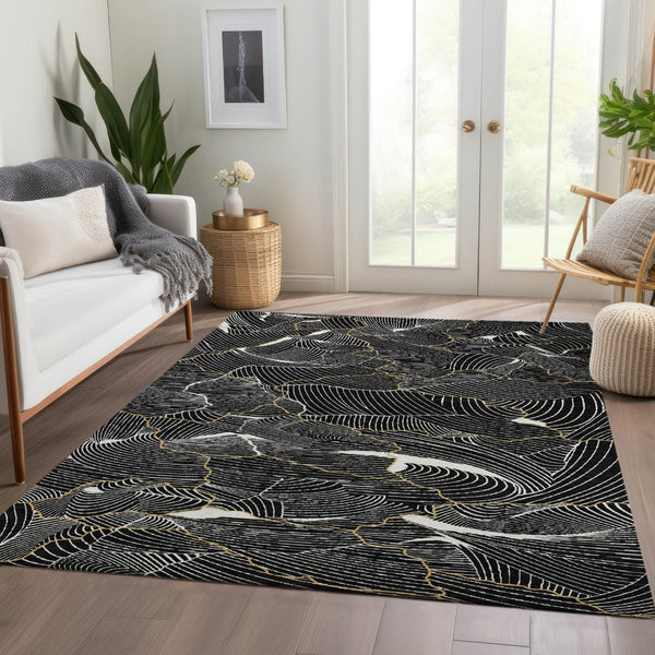 HomeRoots 9' X 12' Stylish Black Ivory Gold Abstract Area Rug - Washable, UV Protected, Stain-Resistant Design 682186
