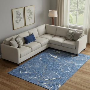 HomeRoots 9' X 12' Abstract Area Rug in Blue, Ivory & Gold - Washable, UV Protected, Perfect for High-Traffic Spaces 682198