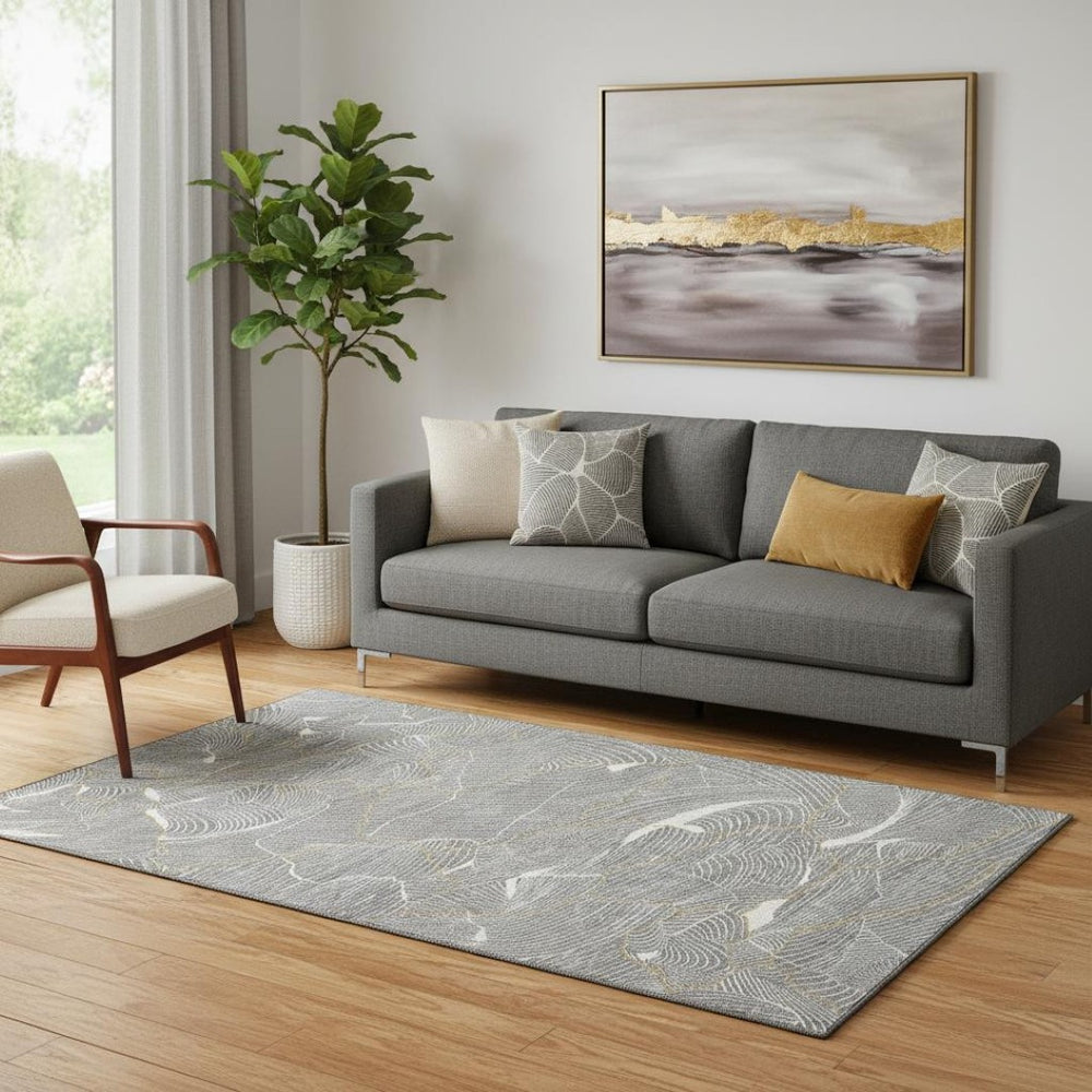 HomeRoots 5' X 8' Abstract Gray Ivory Gold Area Rug - Washable, UV Protected, Modern Design for Busy Homes 682213