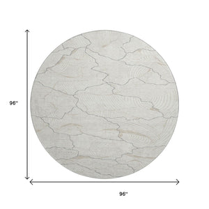 HomeRoots 8' Ivory Taupe and Gray Abstract Round Rug - Washable, UV Resistant, Stylish for High-Traffic Areas 682220