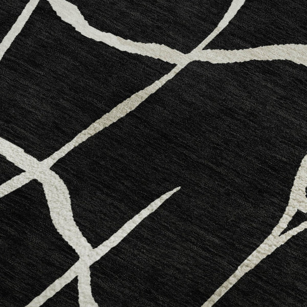 HomeRoots 8' X 10' Black and Ivory Abstract Geometric Area Rug - Durable, Stain-Resistant & UV Protected Design 682257