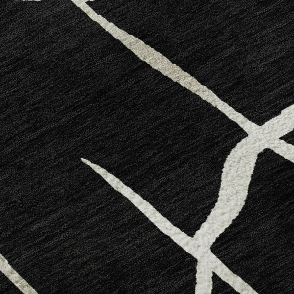 HomeRoots 9' X 12' Black and Ivory Abstract Geometric Area Rug - Durable, Washable with UV Protection & Style! 682258
