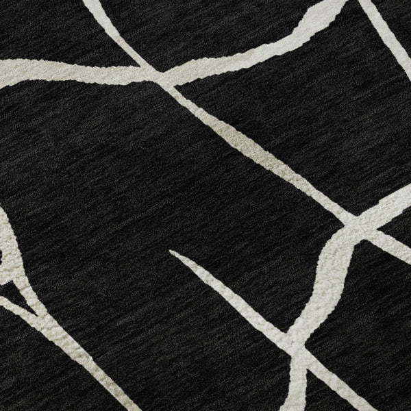 HomeRoots 10' X 14' Black and Ivory Abstract Geometric Area Rug - Washable, UV Protected, Durable & Stylish! 682259