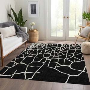 HomeRoots 10' X 14' Black and Ivory Abstract Geometric Area Rug - Washable, UV Protected, Durable & Stylish! 682259