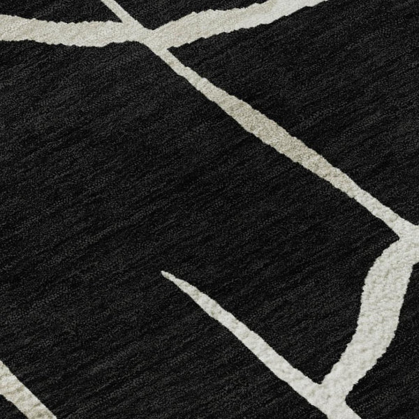 HomeRoots 10' X 14' Black and Ivory Abstract Geometric Area Rug - Washable, UV Protected, Durable & Stylish! 682259