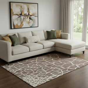 HomeRoots 10' Modern Abstract Geometric Washable Area Rug in Brown, Beige & Gold with UV Protection – Durable Elegance for Busy Homes 682265