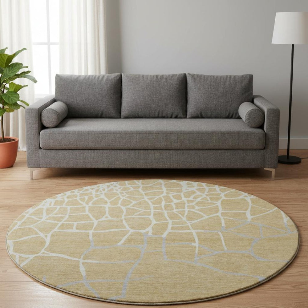 HomeRoots 8' Gold Ivory and Gray Abstract Geometric Round Rug - Washable, UV Protected, Perfect for High-Traffic Areas 682274