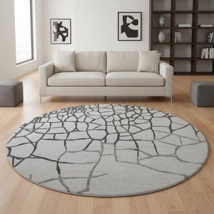 HomeRoots 8' Gray Charcoal and Silver Abstract Geometric Round Rug - Washable, UV Protected, Stain Resistant! 682280