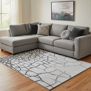 HomeRoots 10' X 14' Modern Gray Charcoal Abstract Area Rug - Washable, UV Protected, Durable for Busy Homes 682283