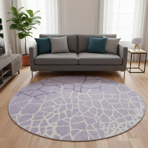 HomeRoots 8' Lavender and Ivory Abstract Geometric Round Rug - Washable, UV Protected, Family-Friendly Design! 682292