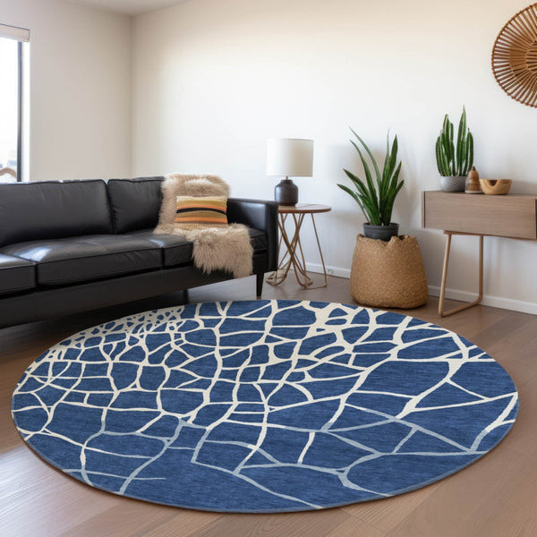 HomeRoots 8' Navy Blue & Ivory Abstract Geometric Round Rug - Washable, UV Protected, Pet-Friendly Comfort 682298