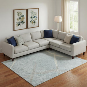 HomeRoots 9' X 12' Sky Blue and Ivory Abstract Geometric Area Rug - Washable, UV-Protected, Durable Design 682312